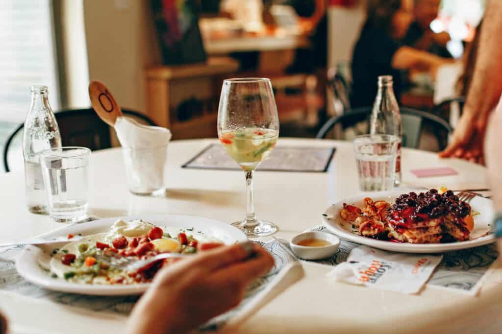Food and wine on the table in the concept of dining out