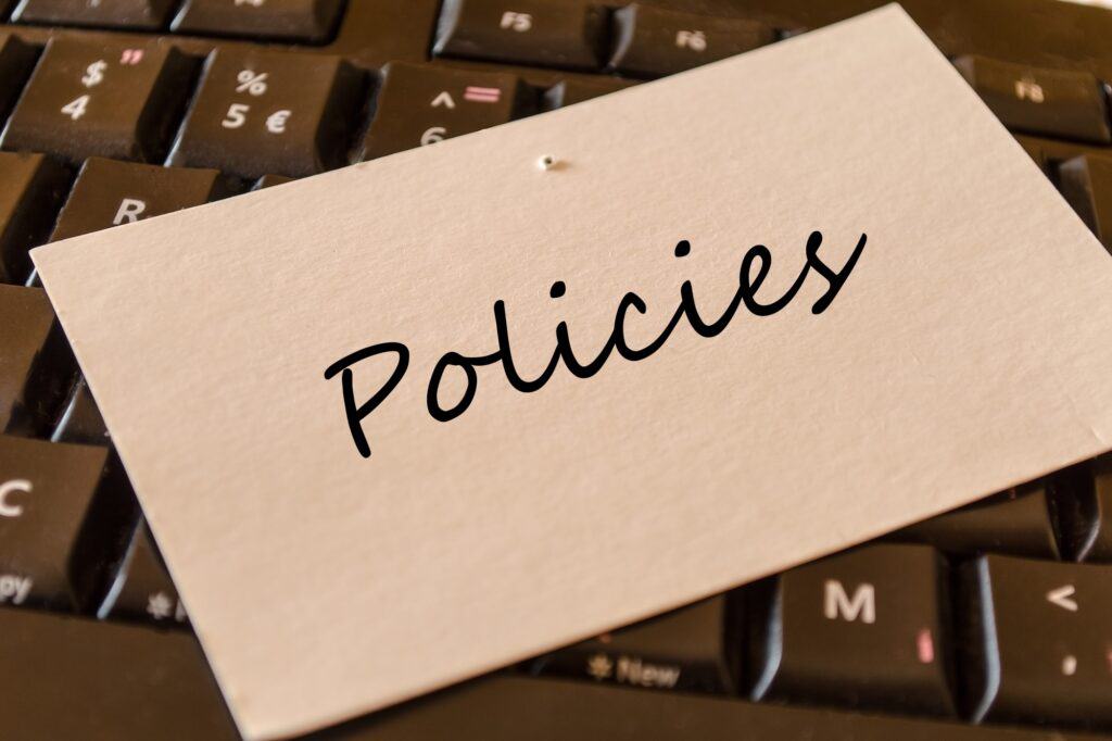 'Policies' note on top of the keyboard