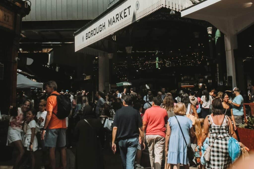 A local market packed with visitors in the concept of 'best local shops and markets in Sutton'.