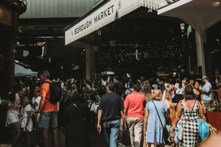 A local market packed with visitors in the concept of 'best local shops and markets in Sutton'.