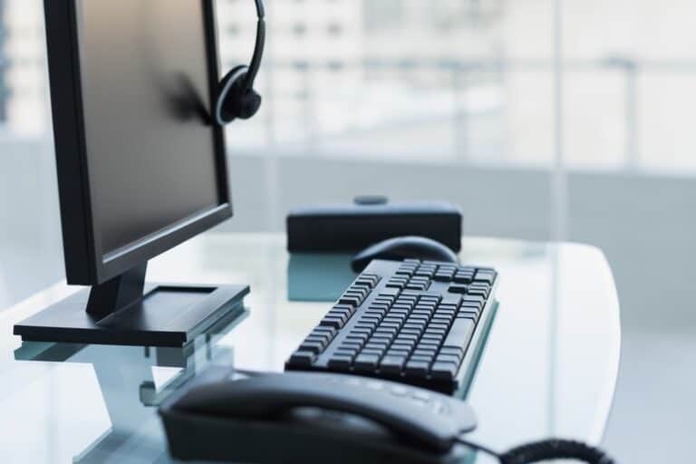 A cropped image of an office desk after office hours in the concept of 'how do office removals services operate in Sutton'.